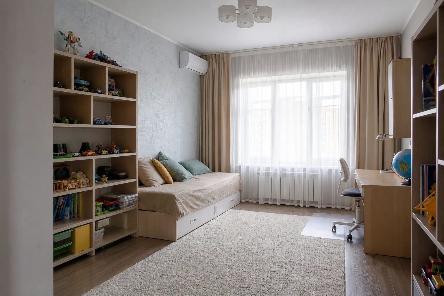 Kids' room in a two-bedroom apartment — after